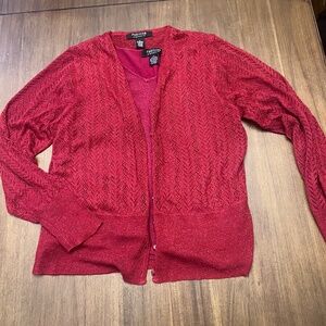 Textured red cardigan.